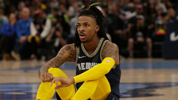 Memphis Grizzlies guard Ja Morant (12) sits on the court during the first half in Game 2 of the second round for the 2022 NBA playoffs.